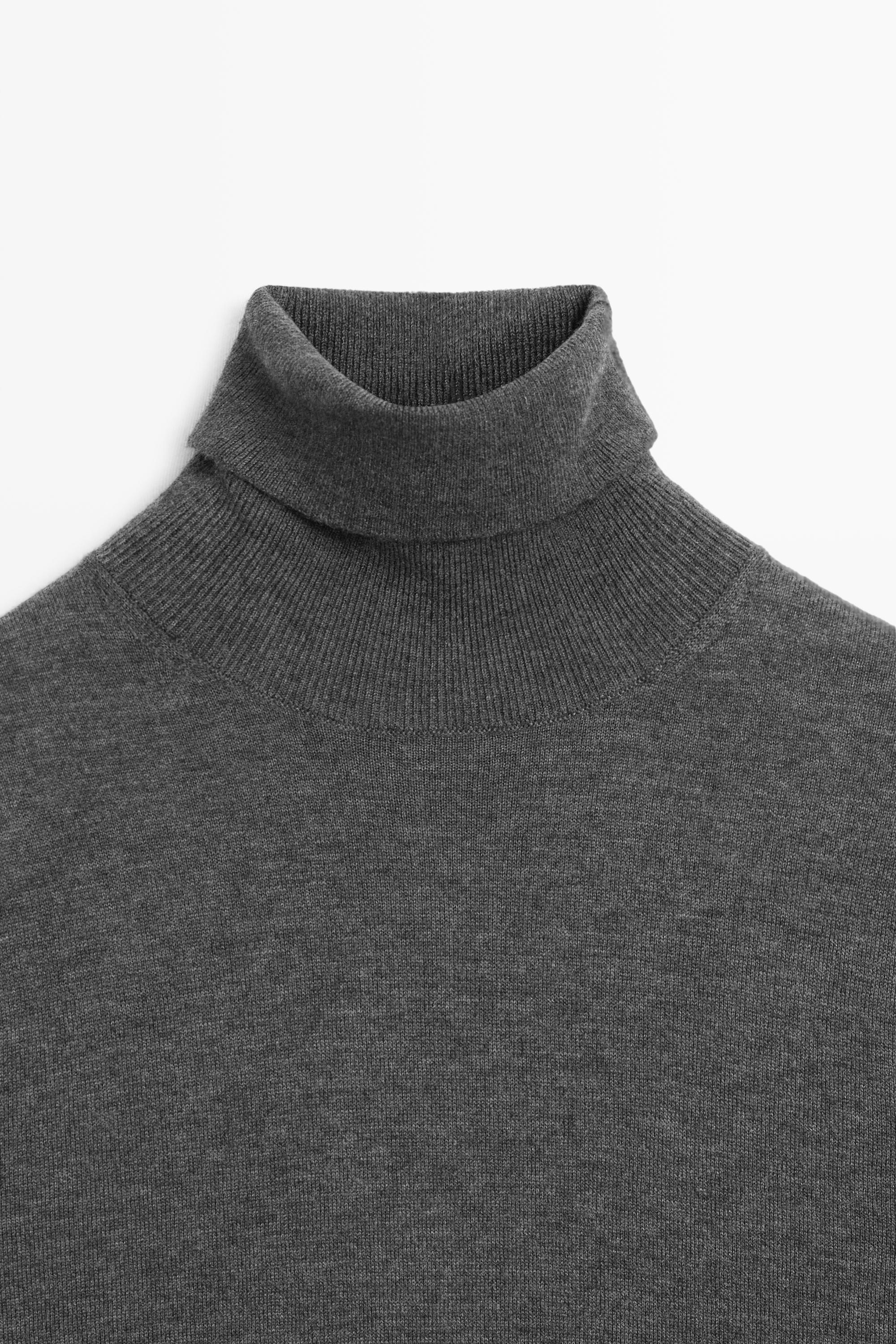 Wool-blend turtleneck knit sweater